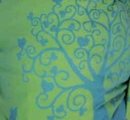 Kangura portabebés Bandolera Kokadi Leon im Wunderland Bambú (Ed. Limitada)